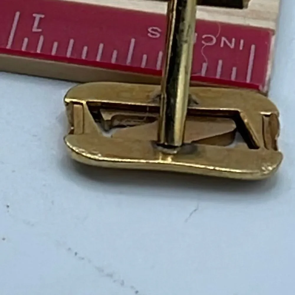 Vintage Anson gold tone shiny matte open design cufflinks.